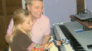Concert Hands Teaches Piano with Wrist Straps and Electrical Zaps